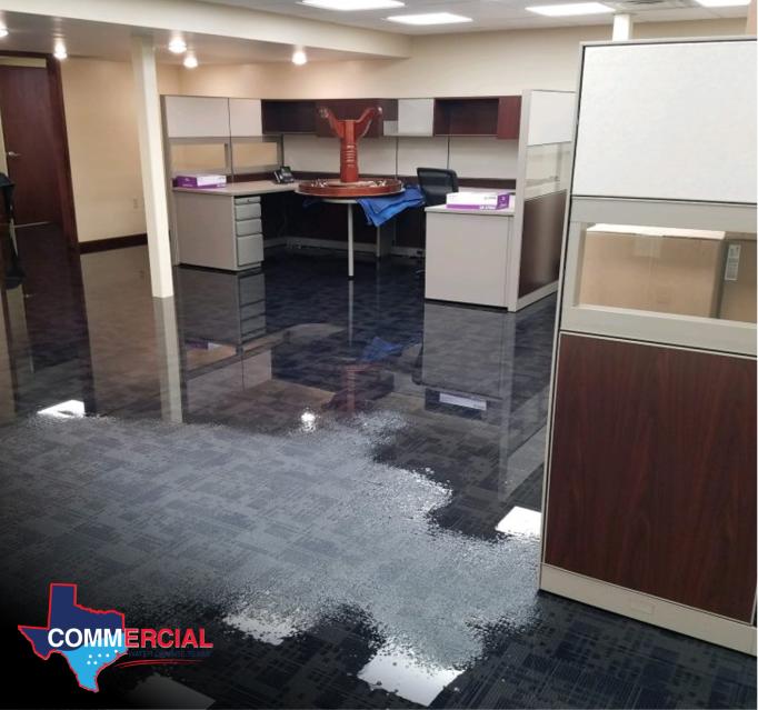 Water spreading across an office floor