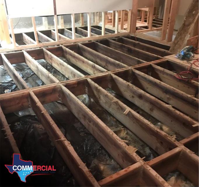 Subfloor exposed after a pipe leak